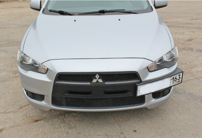 Рамка под номер на передний бампер для Mitsubishi Lancer X (2007-2016) купить недорого с доставкой в Судак